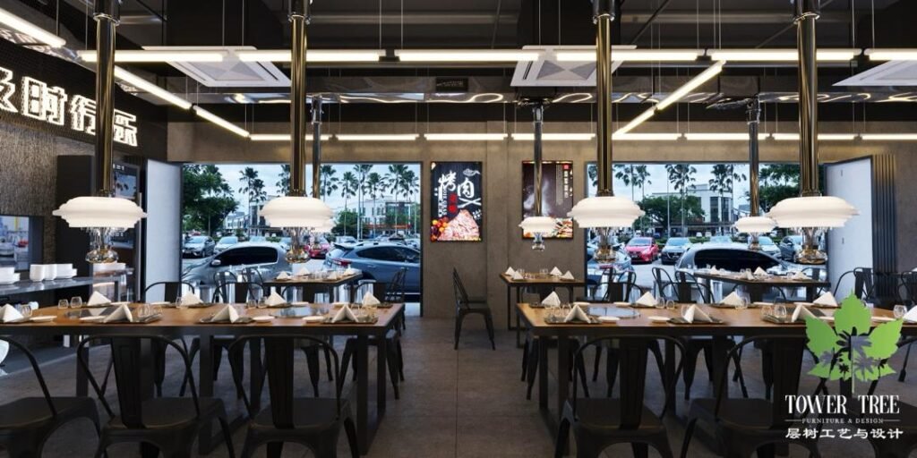 Modern Korean BBQ restaurant dining area with custom banquette seating, overhead exhaust hoods, and graphic wall art designed and renovated by Tower Tree Renovation for Sae Ma Eul BBQ in Austin Crest, Johor.